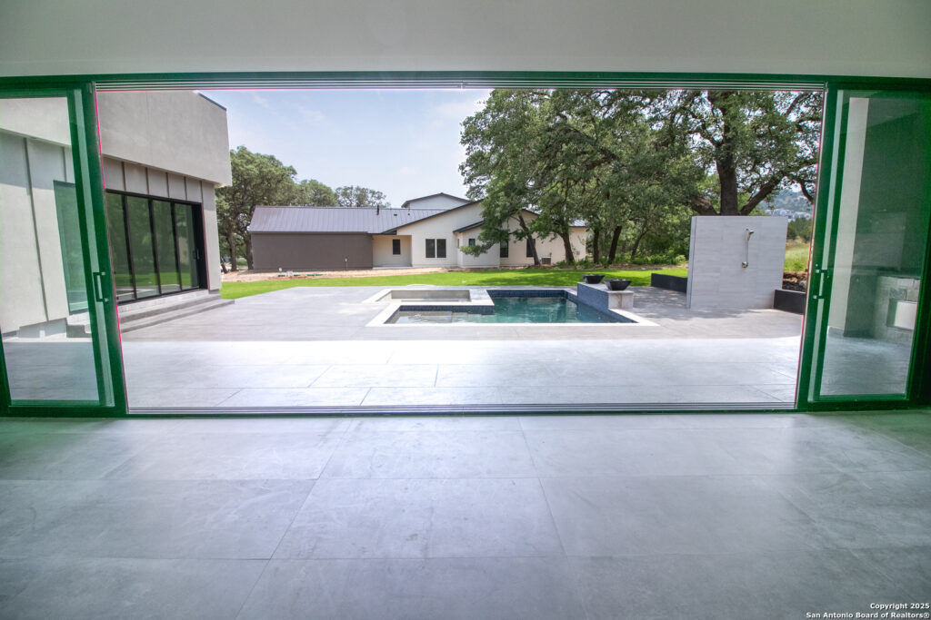 11019 Porter Springs, San Antonio, Texas 78255 View of Pool from Living